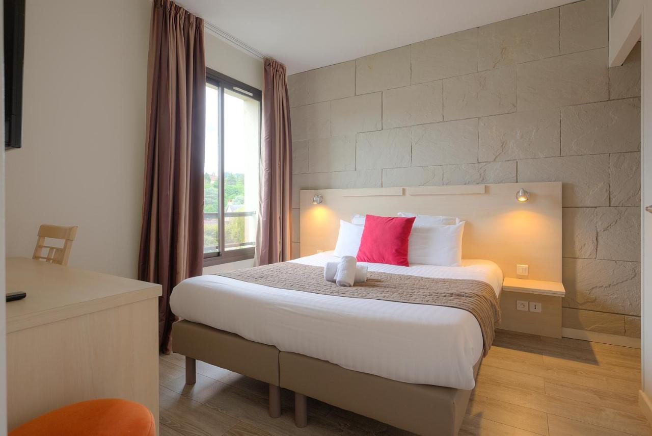 Au Grand Hotel De Sarlat - Pavillon De Selves ภายนอก รูปภาพ